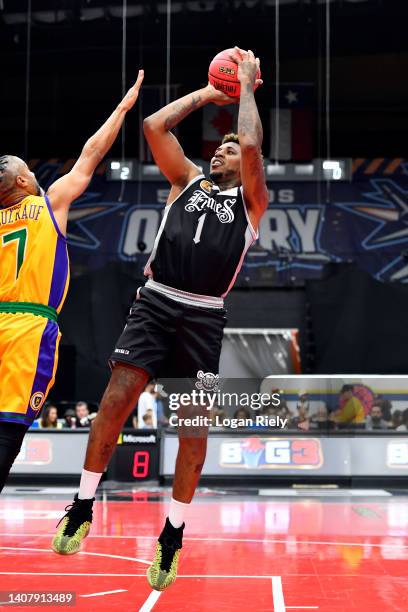 Nick Young of the Enemies shoots the ball against Mahmoud Abdul-Rauf of the 3 Headed Monsters during the game in BIG3 Week Four at Comerica Center on...