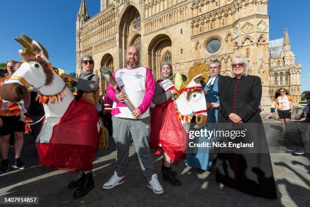 Entertainers with The Very Reverend Christine Wilson - Dean of Lincoln, baton bearer Thomas Draper, Nick Brown - Presenter and Sub Dean of Lincoln...