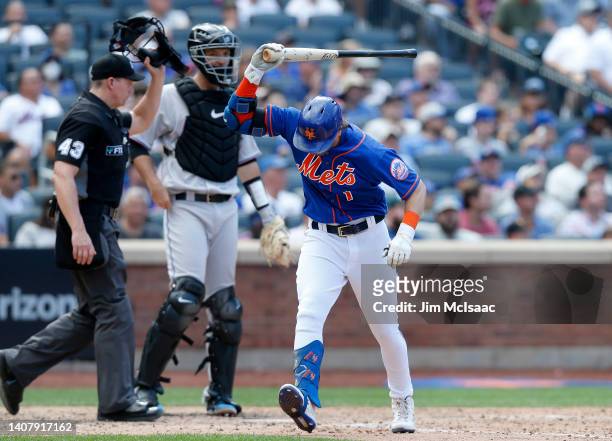 Jeff McNeil of the New York Mets reacts after striking out in the seventh inning while attempting to bunt against the Miami Marlins at Citi Field on...