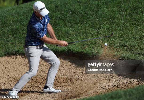 Kevin Streelman of the United States plays a shot from the bunker on the 16th hole during the final round of the Barbasol Championship at Keene Trace...