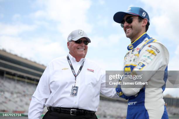 Hall of Famer and team owner Rick Hendrick speaks to Chase Elliott, driver of the NAPA Auto Parts Chevrolet, on the grid prior to the NASCAR Cup...