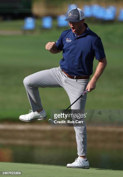 Trey Mullinax of the United States reacts after putting for birdie on the 18th green to win the Barbasol Championship at Keene Trace Golf Club on...