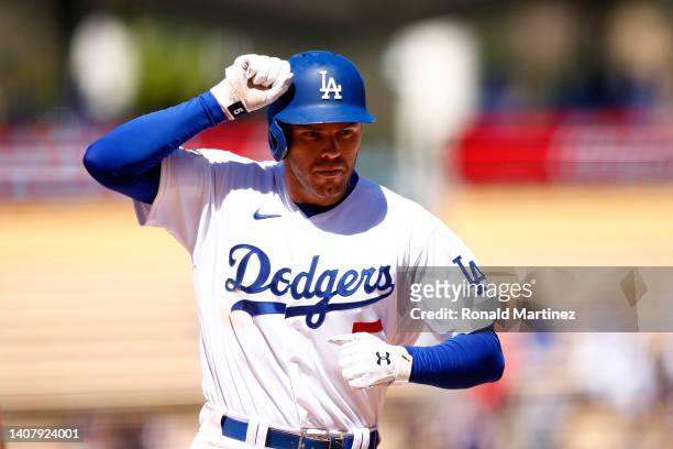 Freddie Freeman of the Los Angeles Dodgers celebrates a home run against the Chicago Cubs in the sixth inning at Dodger Stadium on July 10, 2022 in...