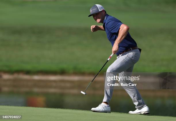 Trey Mullinax of the United States reacts after putting for birdie on the 18th green to win the Barbasol Championship at Keene Trace Golf Club on...