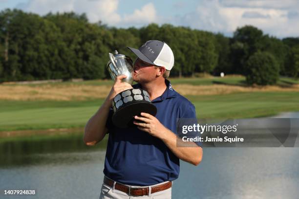 Trey Mullinax of the United States poses with the trophy after winning the Barbasol Championship at Keene Trace Golf Club on July 10, 2022 in...