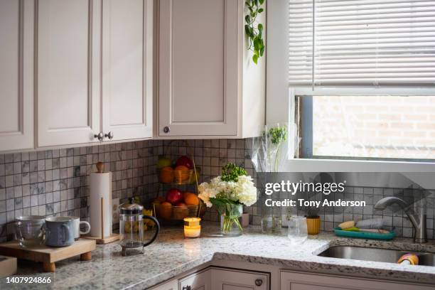 view of home kitchen counter top - brightly lit kitchen stock pictures, royalty-free photos & images