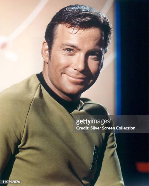 William Shatner, Canadian actor, in a costume, smiling in a publicity portrait issued for the US television series, 'Star Trek', circa 1968. The...