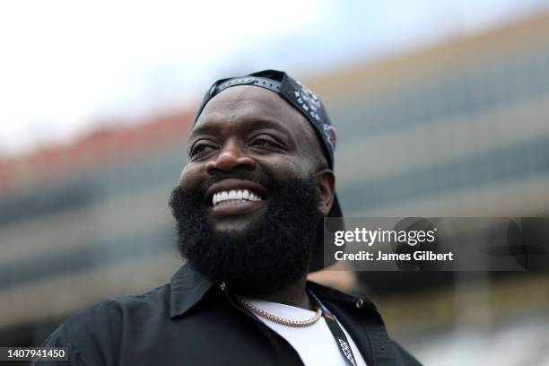 Rapper Rick Ross walks the grid prior to the NASCAR Cup Series Quaker State 400 at Atlanta Motor Speedway on July 10, 2022 in Hampton, Georgia.