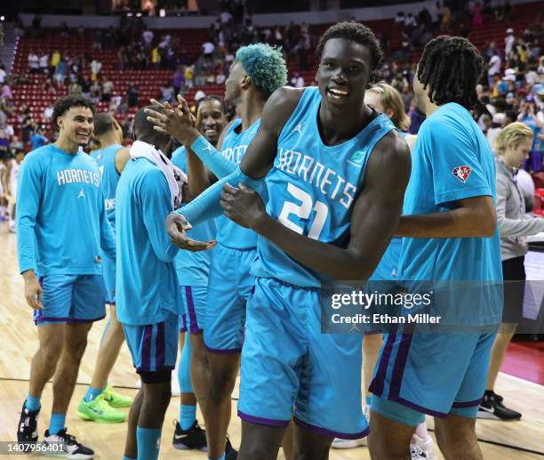 Thor of the Charlotte Hornets celebrates with teammates on the court after he hit a 3-pointer against the Los Angeles Lakers in sudden-death overtime...