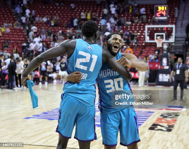 Thor and LJ Figueroa of the Charlotte Hornets celebrate on the court after Thor hit a 3-pointer against the Los Angeles Lakers in sudden-death...