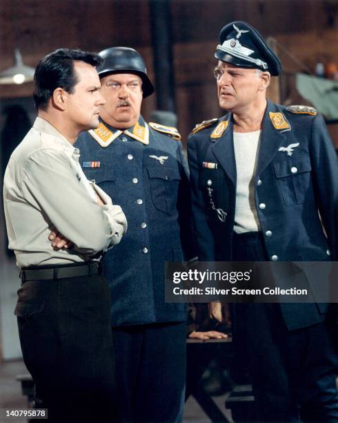 Bob Crane , US actor, John Banner , Austrian actor, and Werner Klemperer , German actor, in costume in a publicity still issued for the US television...