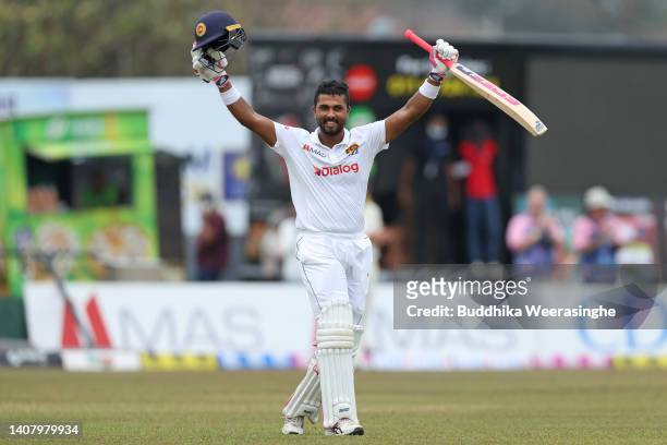 Dinesh Chandimal of Sri Lanka celebrates after marking 200 runs during day four of the Second Test in the series between Sri Lanka and Australia at...