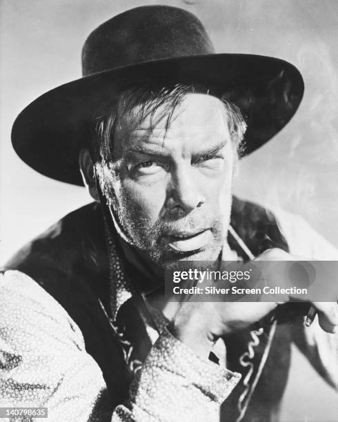 Lee Marvin , US actor, in costume with a black cowboy hat in a publicity portrait issued for the film, 'Cat Ballou', USA, 1965. The comedy-western,...