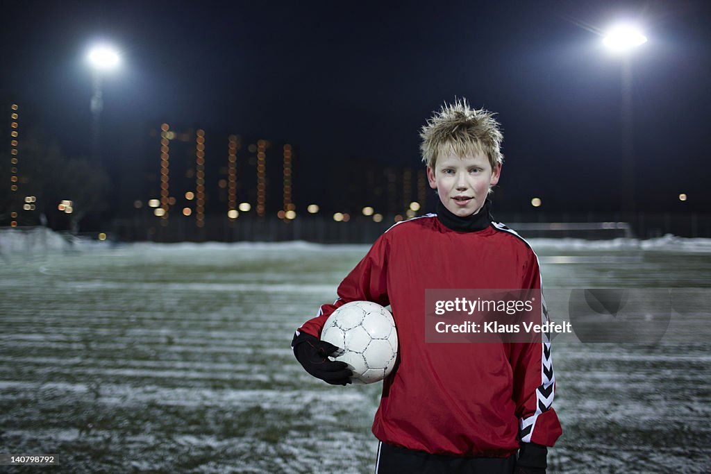 Portrait of a boy with a football (soccer)