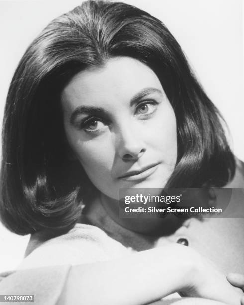 Headshot of Jean Marsh, British actress, in a studio portrait, against a white background, circa 1970.