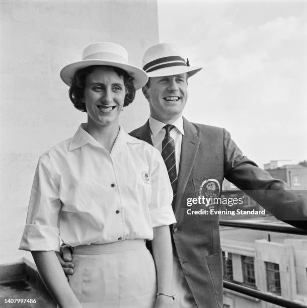 British athlete Dorothy Hyman and British athlete David Jones, both sprinters, wearing uniforms for the forthcoming 1962 British Empire and...