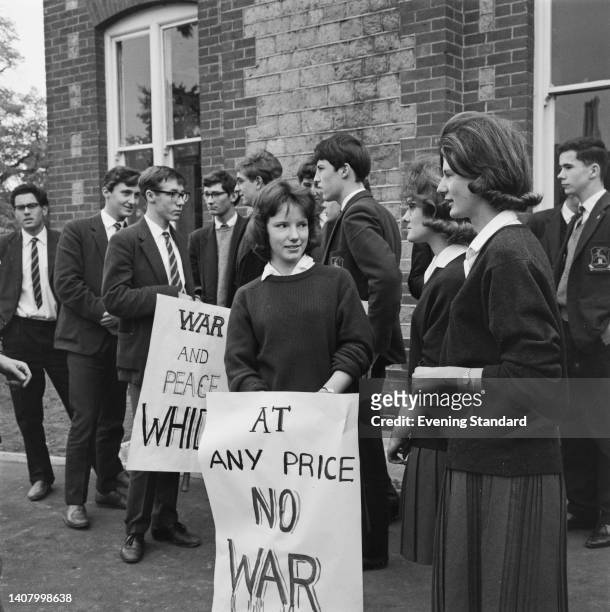 Male and female pupils of Midhurst Grammar School on strike, prepare to march in protest against the Cuban Missile Crisis in Midhurst, West Sussex,...