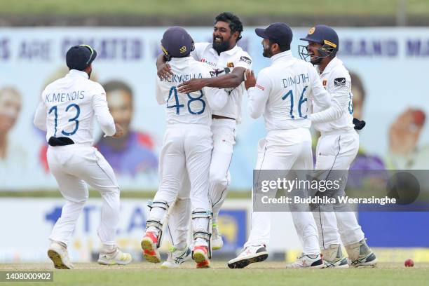 Prabath Jayasuriya of Sri Lanka celebrates with teammates after taking the wicket Steven Smith of Australia during day four of the Second Test in the...