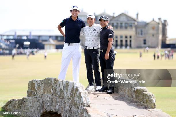 Rikuya Hoshino, Kazuki Higa and Shugo Imahira of Japan pose for a photo on the 18th bridge during a practice round prior to The 150th Open at St...