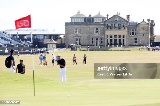 Rikuya Hoshino of Japan chips on the 18th during a practice round prior to The 150th Open at St Andrews Old Course on July 11, 2022 in St Andrews,...