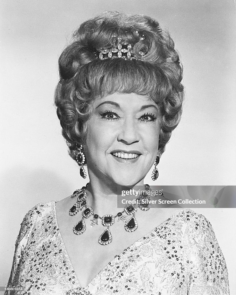 Ethel Merman , US actress and singer, smiling and wearing a jewelled