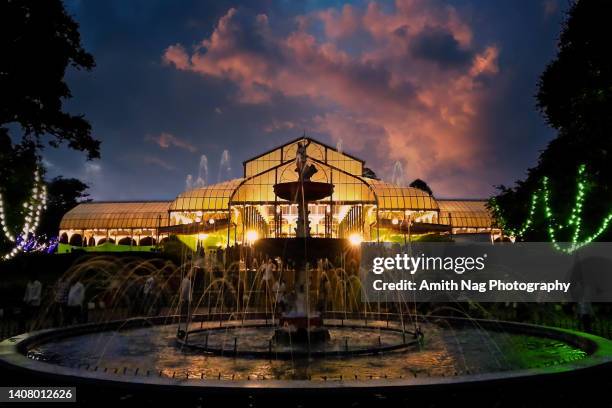 a colorful evening at the glass house inside, lalbagh, bangalore - bangalore cityscape stock pictures, royalty-free photos & images