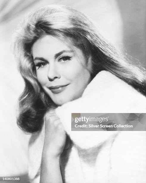 Elizabeth Montgomery , US actress, wearing a white fur coat in a studio portrait, against a light background, circa 1960.
