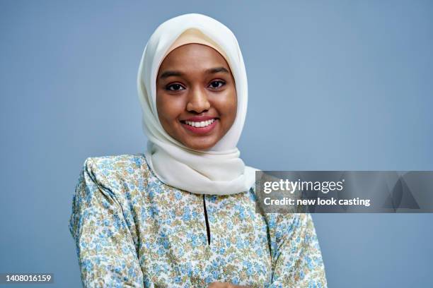 hijab with malay traditional clothing looking at camera - scarf isolated stock pictures, royalty-free photos & images