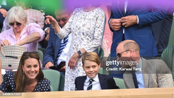 Catherine, Duchess of Cambridge, Prince George of Cambridge and Prince William, Duke of Cambridge attend The Wimbledon Men's Singles Final at All...