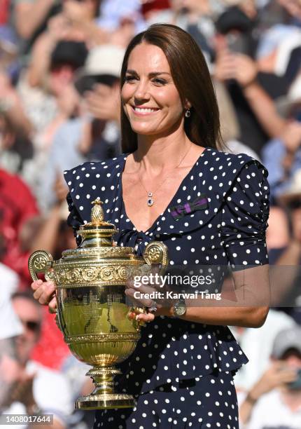 Catherine, Duchess of Cambridge holds the Wimbledon Trophy at the Wimbledon Men's Singles Final at All England Lawn Tennis and Croquet Club on July...