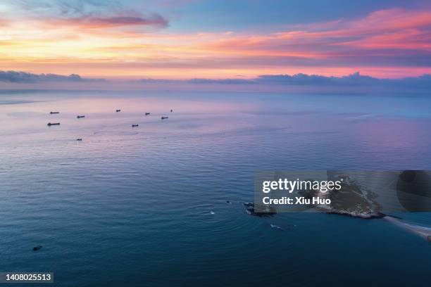 sunset in zhangzhou coastal fishing village, fujian province - stadtbezirk xiamen stock-fotos und bilder