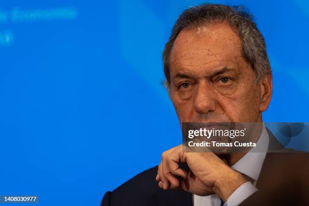 Daniel Scioli Minister of Productive Development gestures during while Minister of Economy Silvina Batakis speaks during a press conference to...