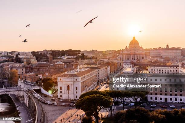 aerial view of rome skyline at sunset, italy - rom stock-fotos und bilder