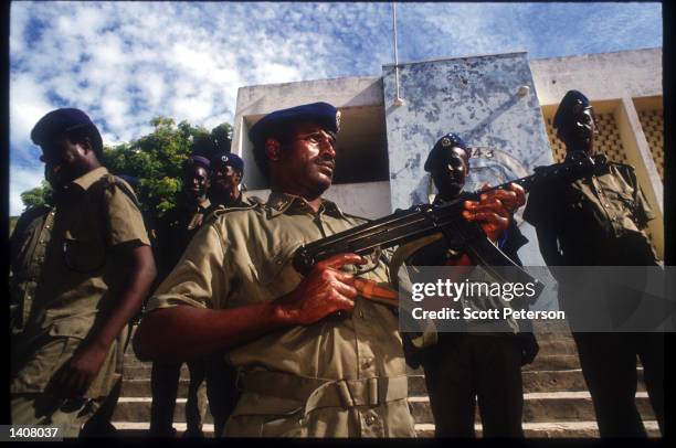 Somali police officers pose May 4, 1993 in Mogadishu, Somalia. Following the departure of US forces, UN troops continue the humanitarian intervention...