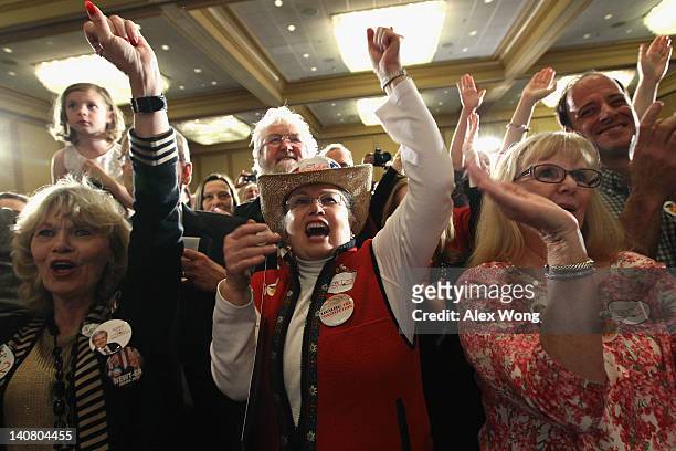 Supporters cheer for Republican presidential candidate, former Speaker of the House Newt Gingrich after being declared the winner of the primary in...