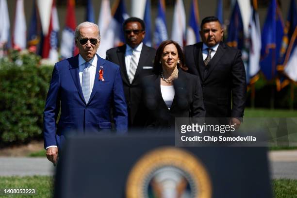 President Joe Biden, Garnell Whitfield Jr., Vice President Kamala Harris and Dr. Dr. Roy Guerrero arrive for an event to celebrate the Bipartisan...