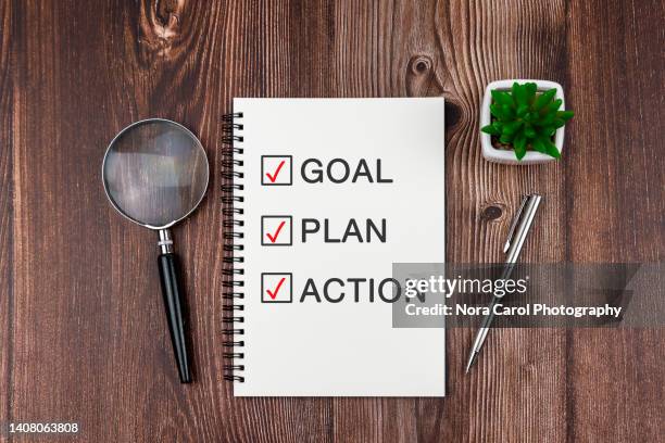 goal plan action checklist on note pad - personal organizer stock pictures, royalty-free photos & images