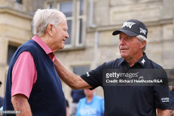 Jack Nicklaus speaks with Gary Player of South Africa on the first tee during the Celebration of Champions prior to The 150th Open at St Andrews Old...