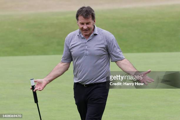 Sir Nick Faldo of England reacts on the 18th during the Celebration of Champions Challenge during a practice round prior to The 150th Open at St...
