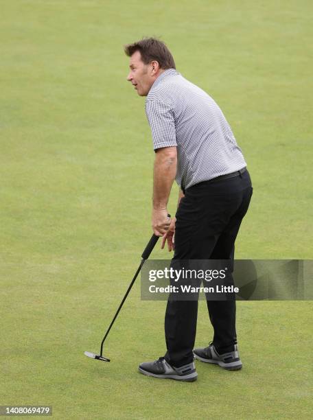 Sir Nick Faldo of England putts on the 18th during the Celebration of Champions Challenge during a practice round prior to The 150th Open at St...