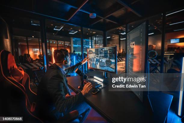excited asian chinese esports game host streamer online live streaming hosting in game room with voip and instant messaging social platform. - compere stock pictures, royalty-free photos & images