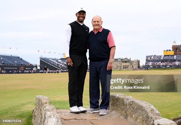 Tiger Woods of The United States poses for a photo with Jack Nicklaus on the 18th bridge during the Celebration of Champions Challenge during a...