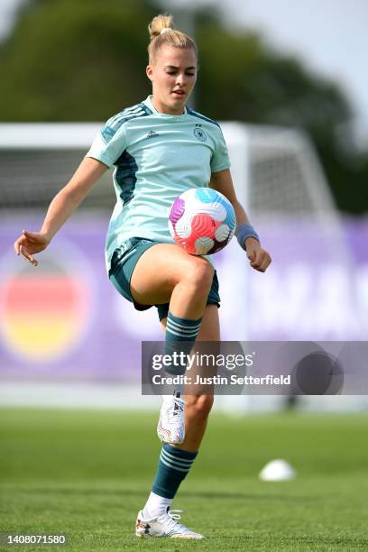 Laura Freigang of Germany warms up during the UEFA Women's Euro 2022 Germany Training Session at Brentford Community Stadium on July 11, 2022 in...