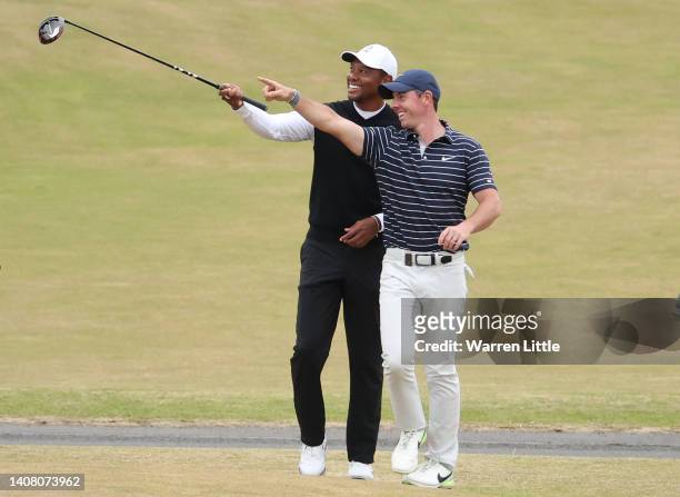 Tiger Woods of The United States and Rory McIlroy of Northern Ireland interact on the 18th during the Celebration of Champions Challenge during a...