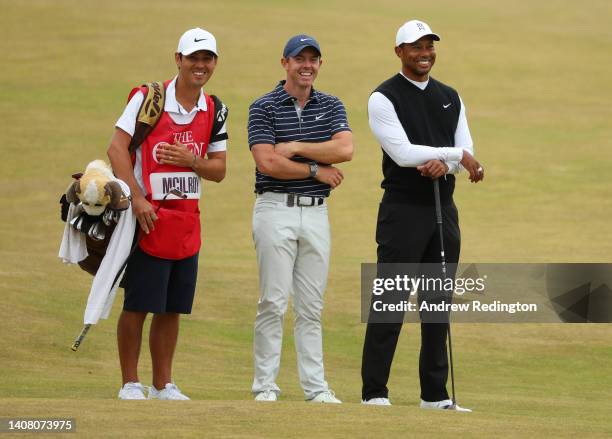 Tiger Woods of The United States and Rory McIlroy of Northern Ireland interact on the 18th during the Celebration of Champions Challenge during a...