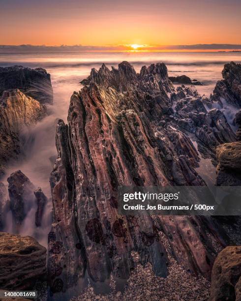 scenic view of sea against sky during sunset,bay of plenty,new zealand - mount maunganui stock-fotos und bilder