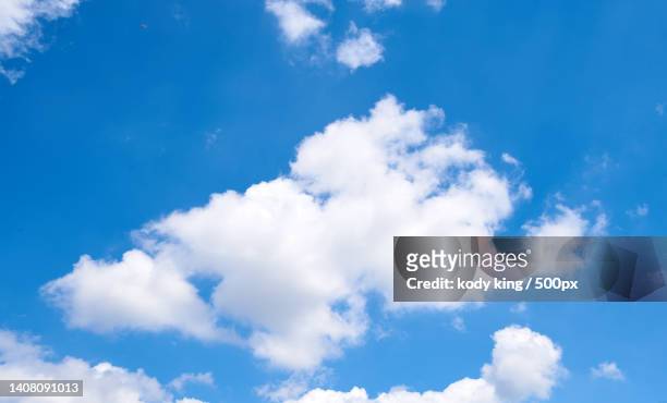 low angle view of clouds in blue sky - 素材 stock pictures, royalty-free photos & images