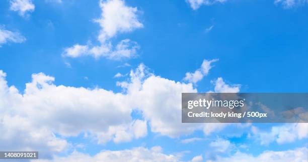 low angle view of clouds in blue sky - 素材 stock pictures, royalty-free photos & images