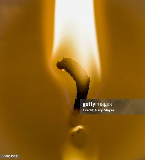 candle flame - christmas candle stock pictures, royalty-free photos & images