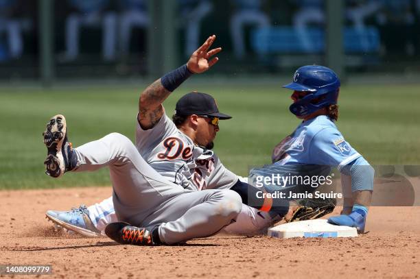Bobby Witt Jr. #7 of the Kansas City Royals slides safely into second base for a seal as Javier Baez of the Detroit Tigers is late with the tag...